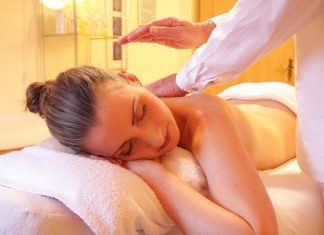 A woman receiving a wellness massage