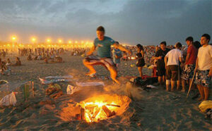 man jumping over fire for san juan and the summer solstice