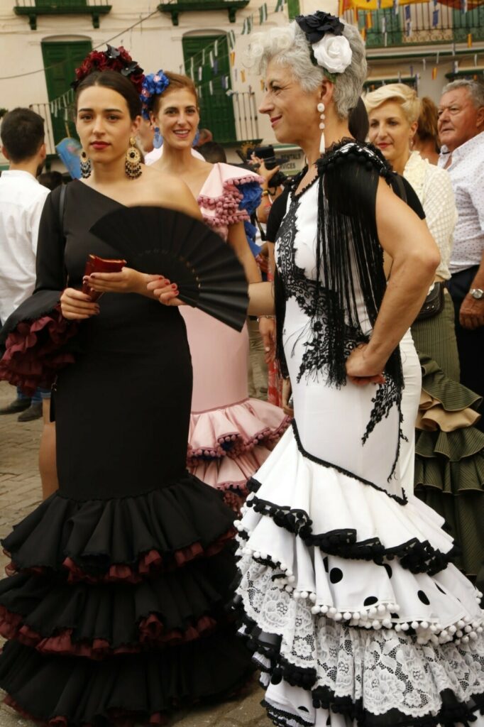 Competa Feria girls in traditional Andalucian dresses