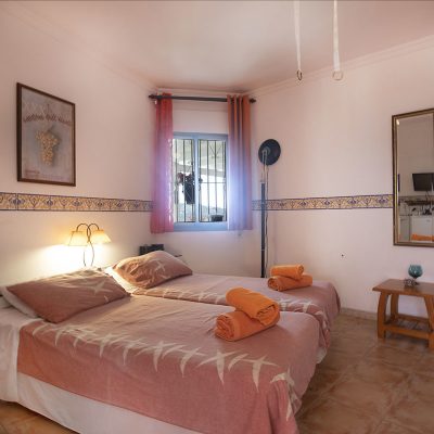 Orange Room bedroom at Villa Andalucia